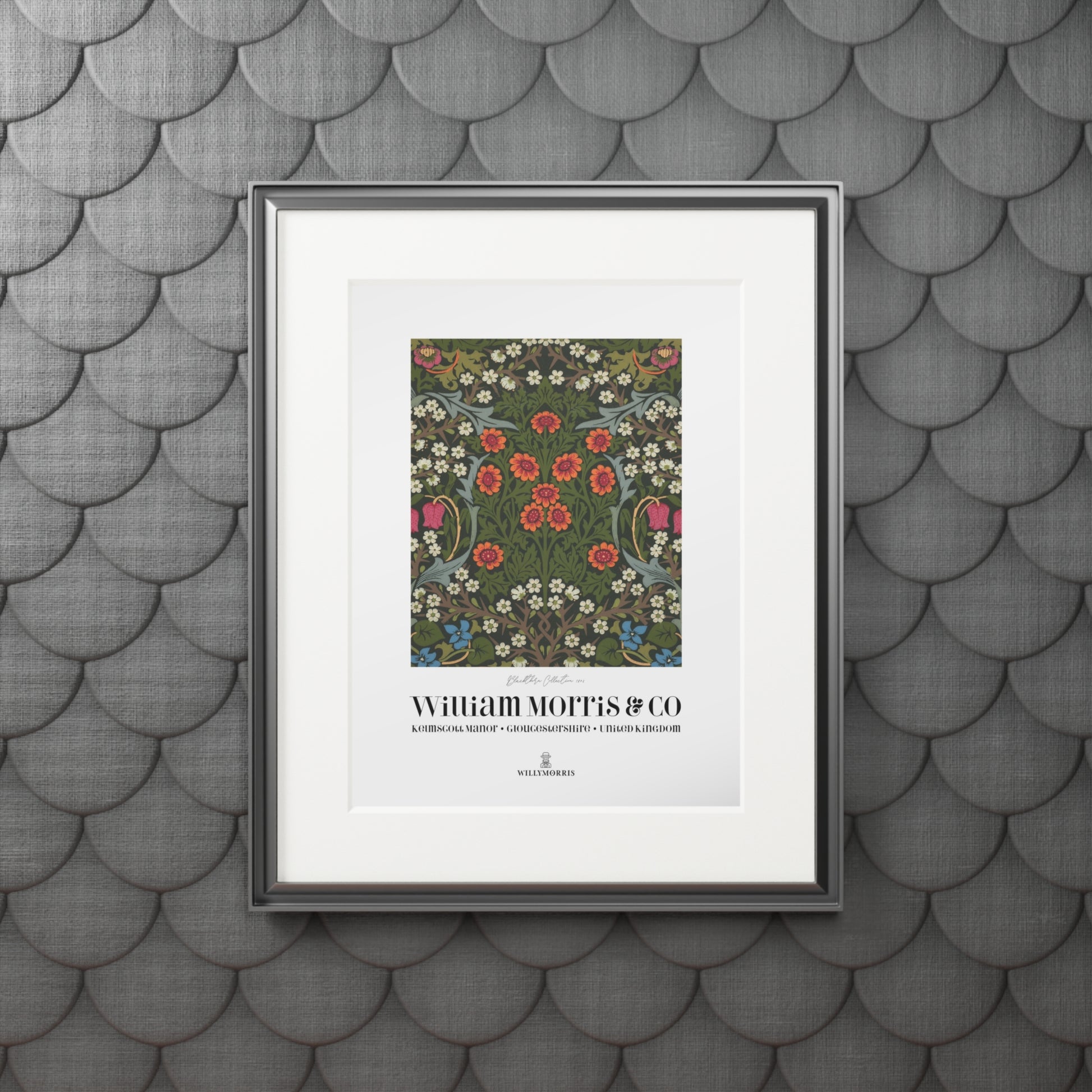 Framed artwork with floral pattern and text on a textured gray wall
