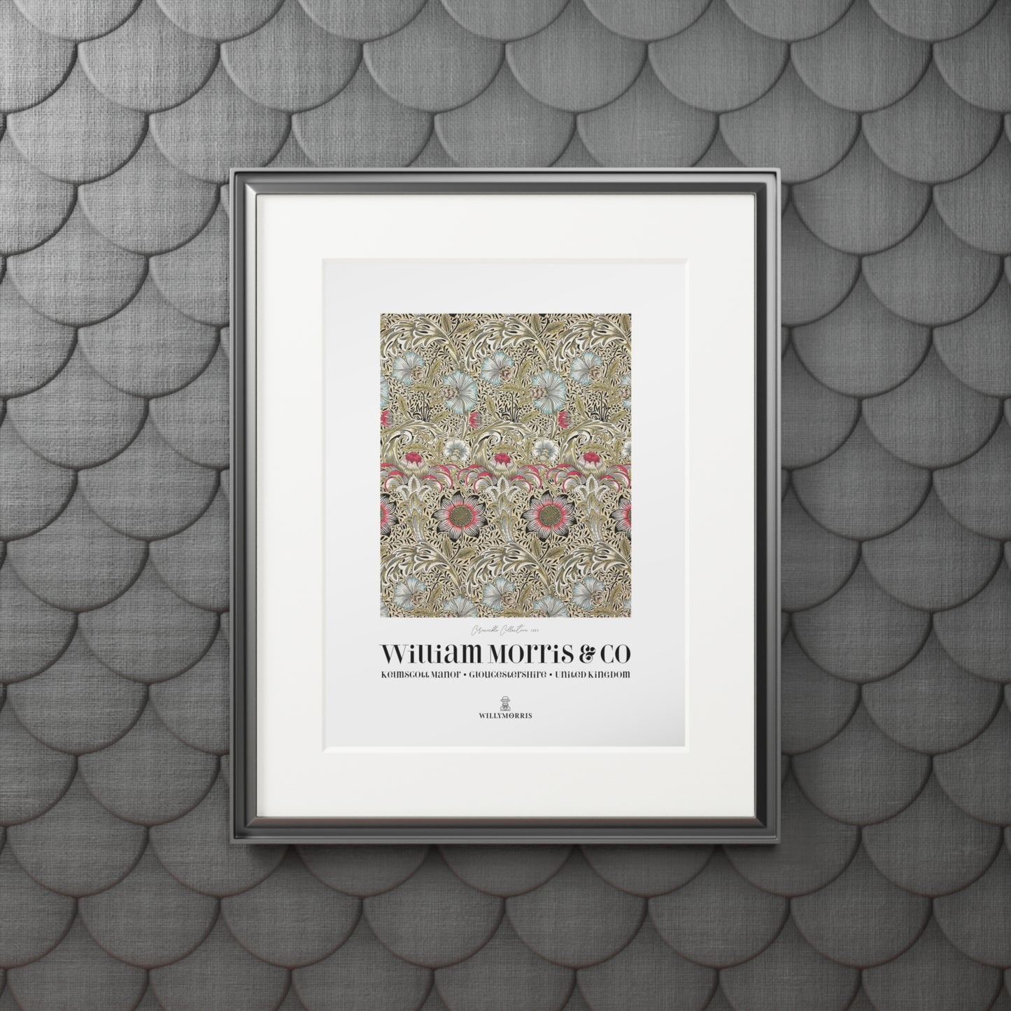 Framed artwork with William Morris & Co design on a textured gray wall.