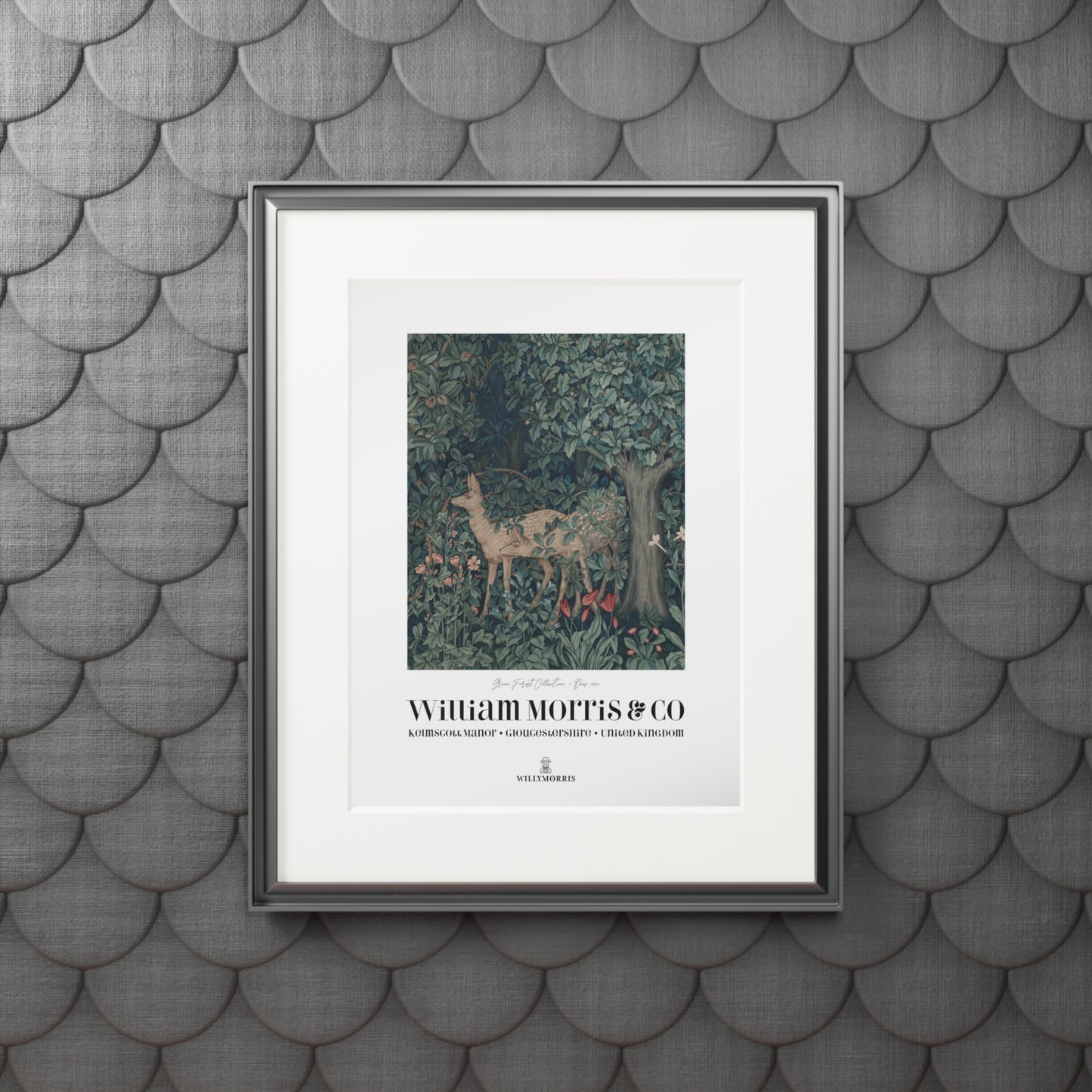 Framed artwork with deer design on a textured gray wall