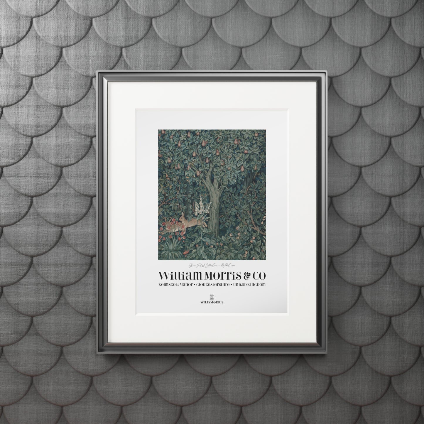Framed artwork with 'William Morris & Co' on a textured gray wall