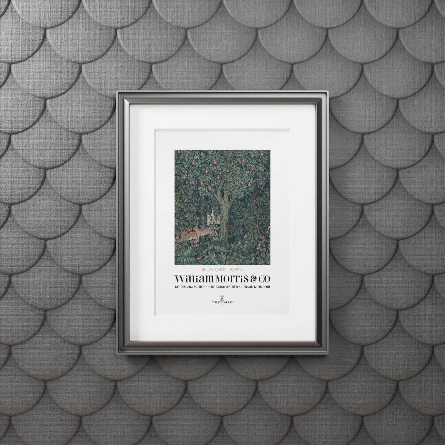 Framed artwork with 'William Morris & Co' on a textured gray wall.