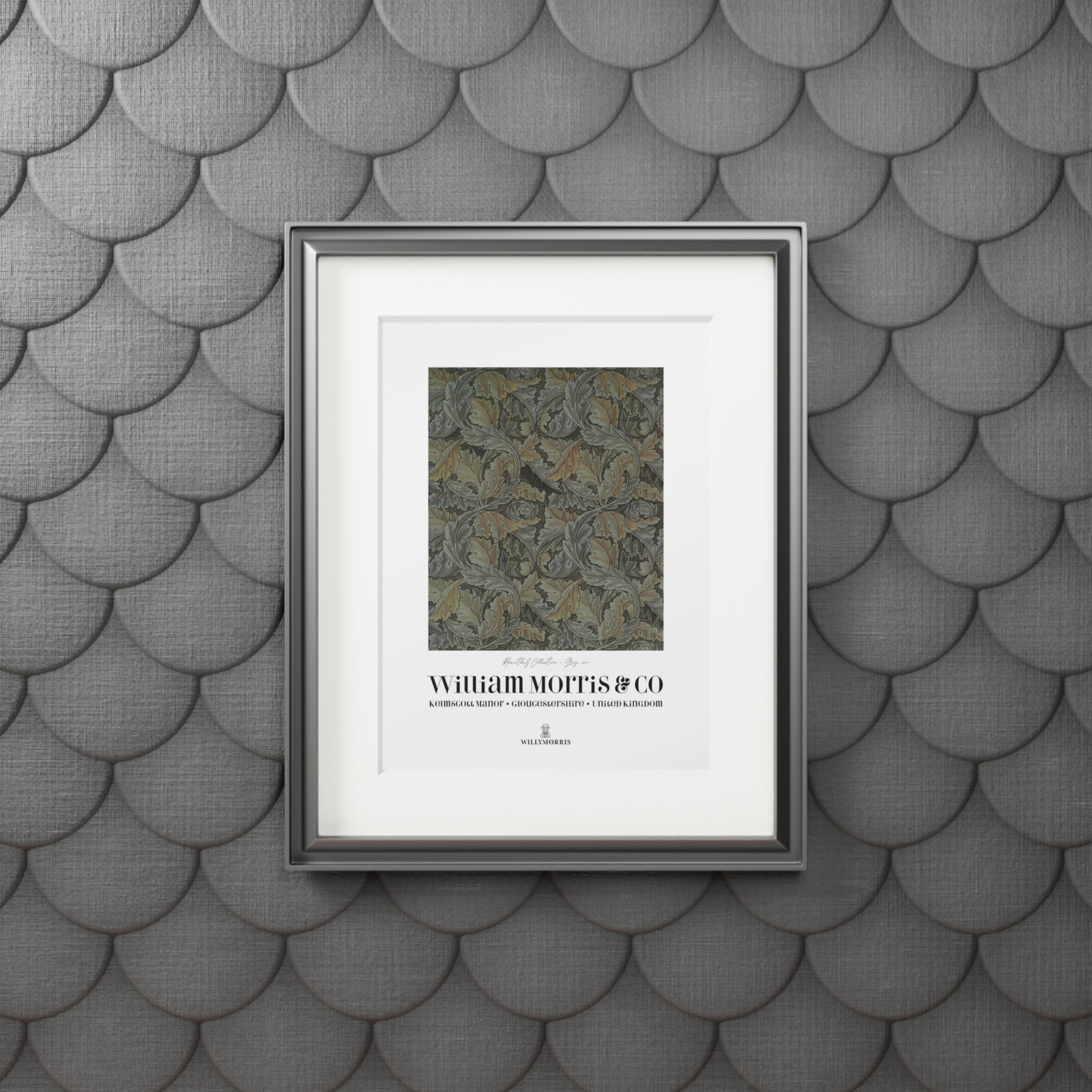 Framed artwork with text and pattern on a textured gray wall