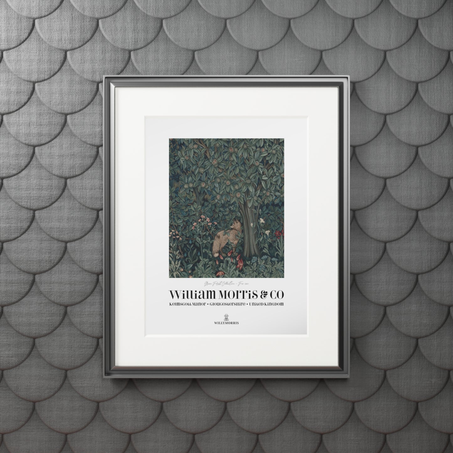 Framed artwork with 'William Morris & Co' on a textured gray wall