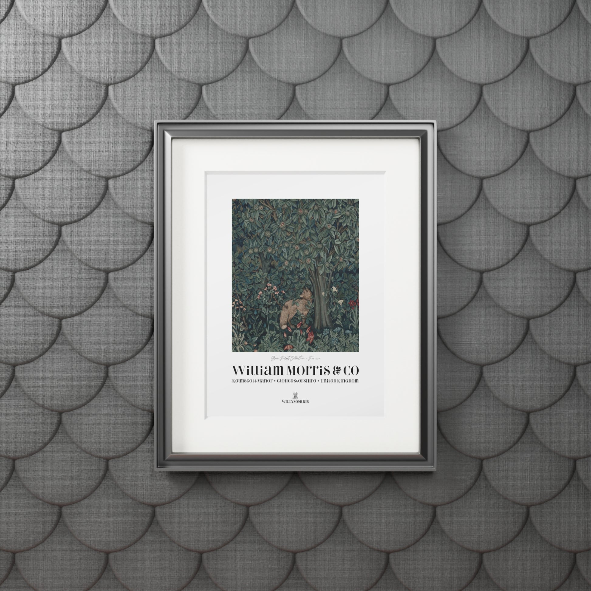 Framed artwork with text on a textured gray wall