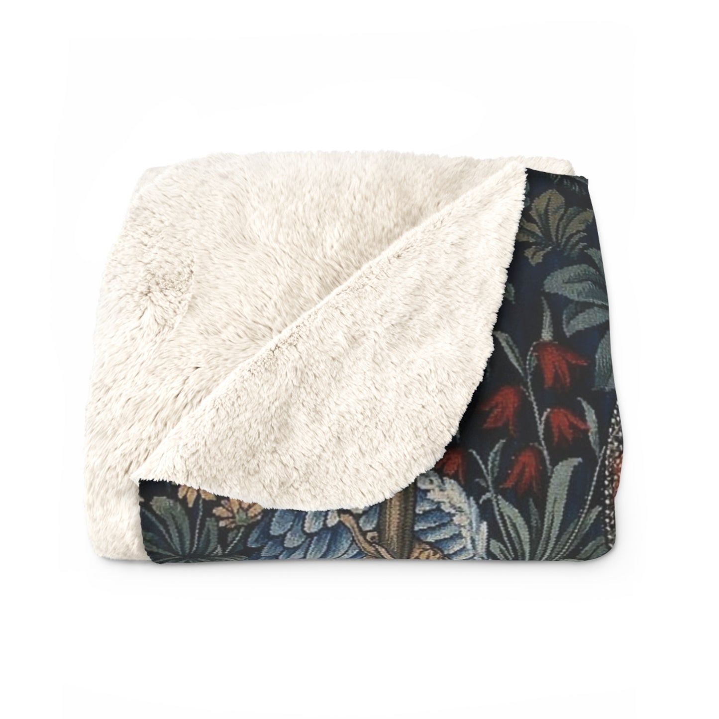 A Sherpa fleece blanket with a floral and angelic pattern inspired by William Morris' work.