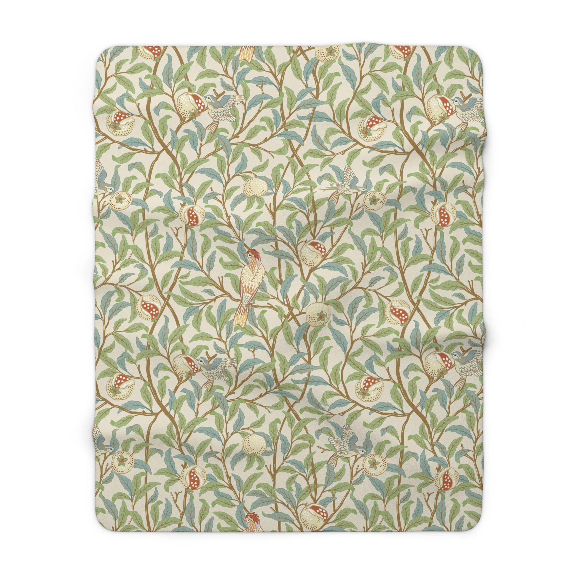 A plush fleece blanket with a floral William Morris & Co pattern featuring birds and pomegranates, predominantly in green tones.