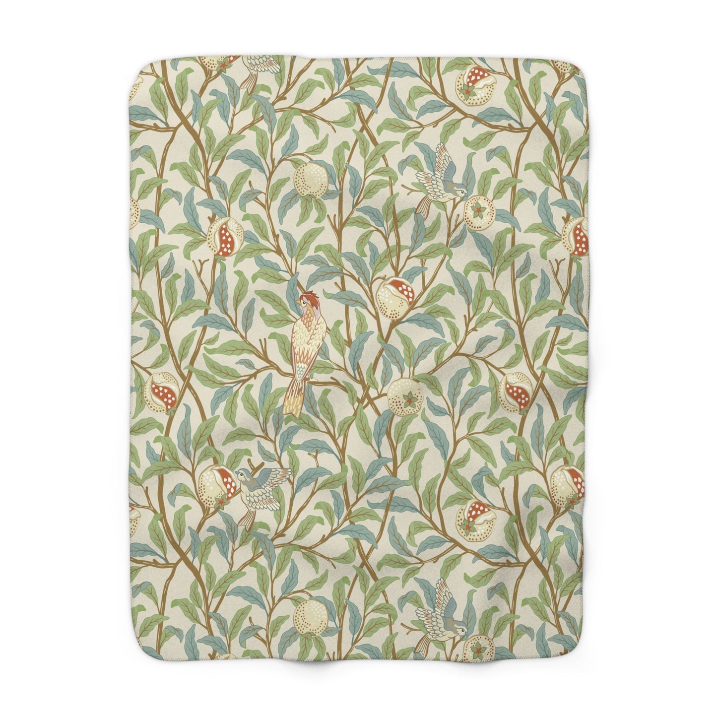 A plush fleece blanket with a floral William Morris & Co pattern featuring birds and pomegranates, predominantly in green tones.