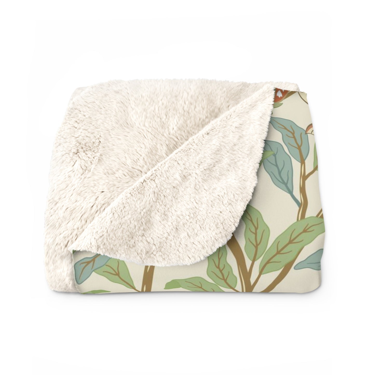 A plush fleece blanket with a floral William Morris & Co pattern featuring birds and pomegranates, predominantly in green tones.