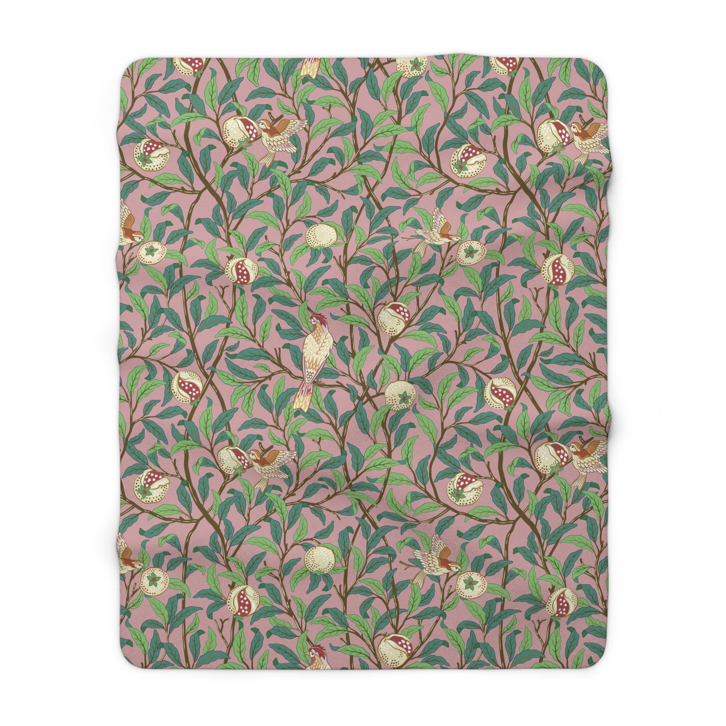 A plush fleece blanket with a floral William Morris & Co pattern featuring birds and pomegranate designs, predominantly in green and pink tones.