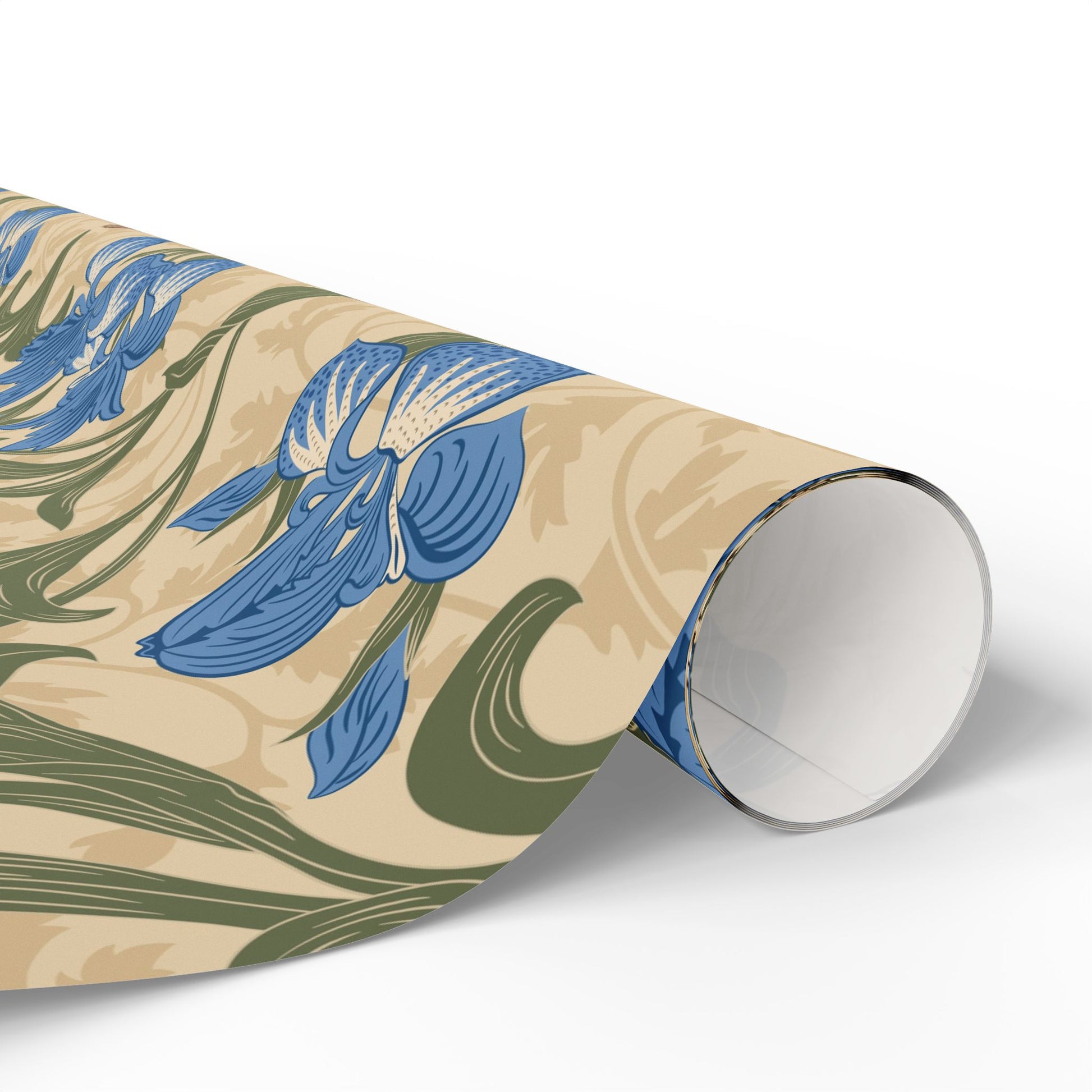 Gifts wrapped in decorative wrapping paper with William Morris & Co floral patterns, placed on a table alongside a roll of paper, scissors, and tags.