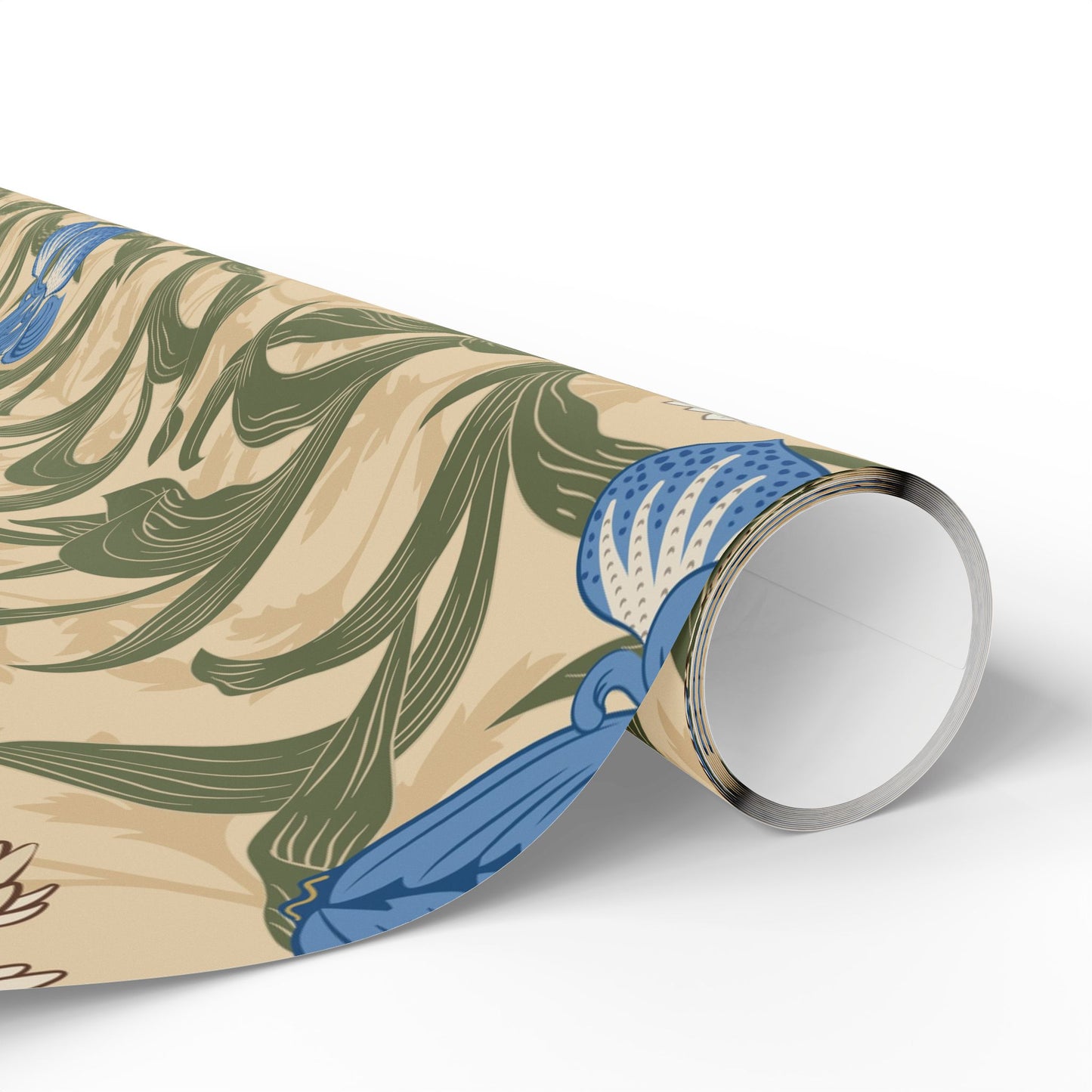 Gifts wrapped in decorative wrapping paper with William Morris & Co floral patterns, placed on a table alongside a roll of paper, scissors, and tags.
