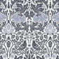 Decorative pattern with rabbits, birds, and foliage in gray and white on a gray background