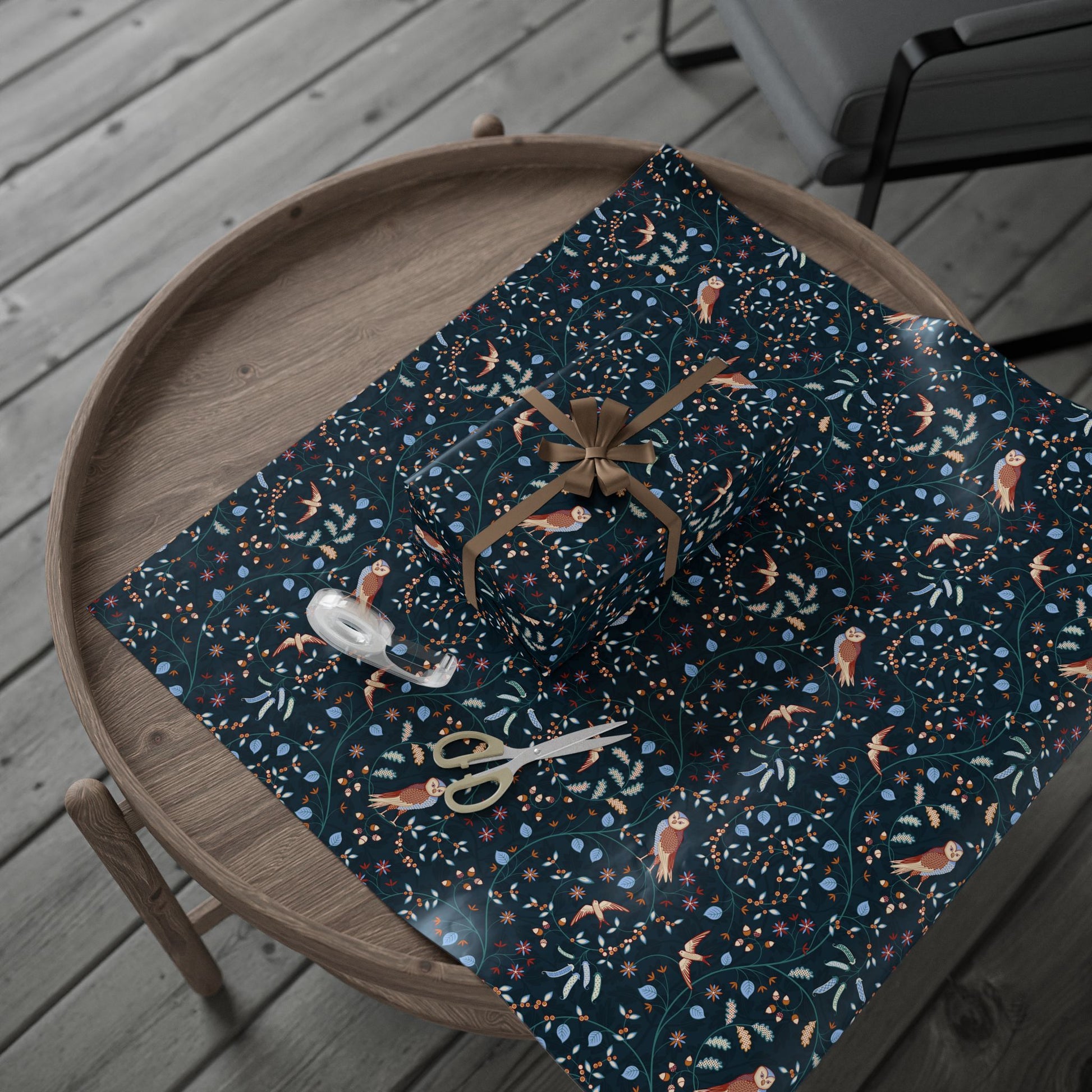 Patterned fabric with scissors on a wooden tray outdoors