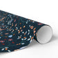 Roll of decorative paper with a floral pattern on a white background