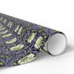 Roll of floral-patterned wrapping paper on a white background