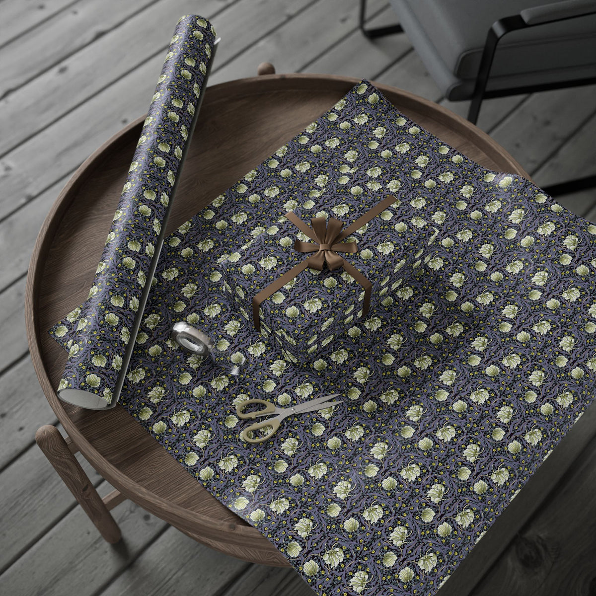 Gift wrap with floral pattern on a wooden table