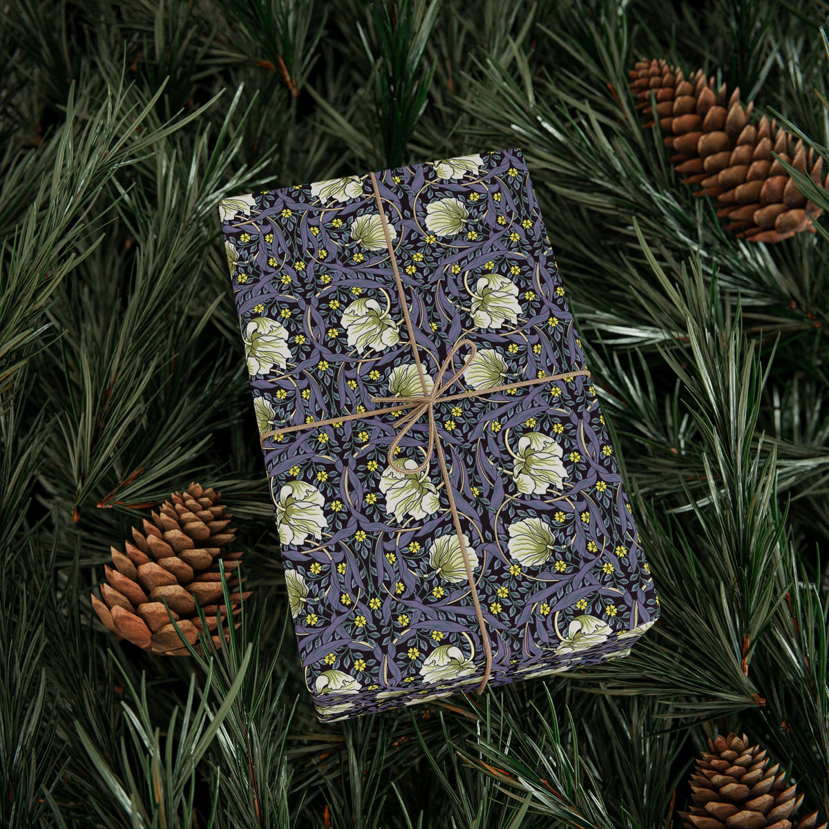 Decorative wrapping paper with floral pattern on green foliage