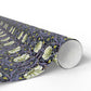 Roll of floral patterned paper on a white background