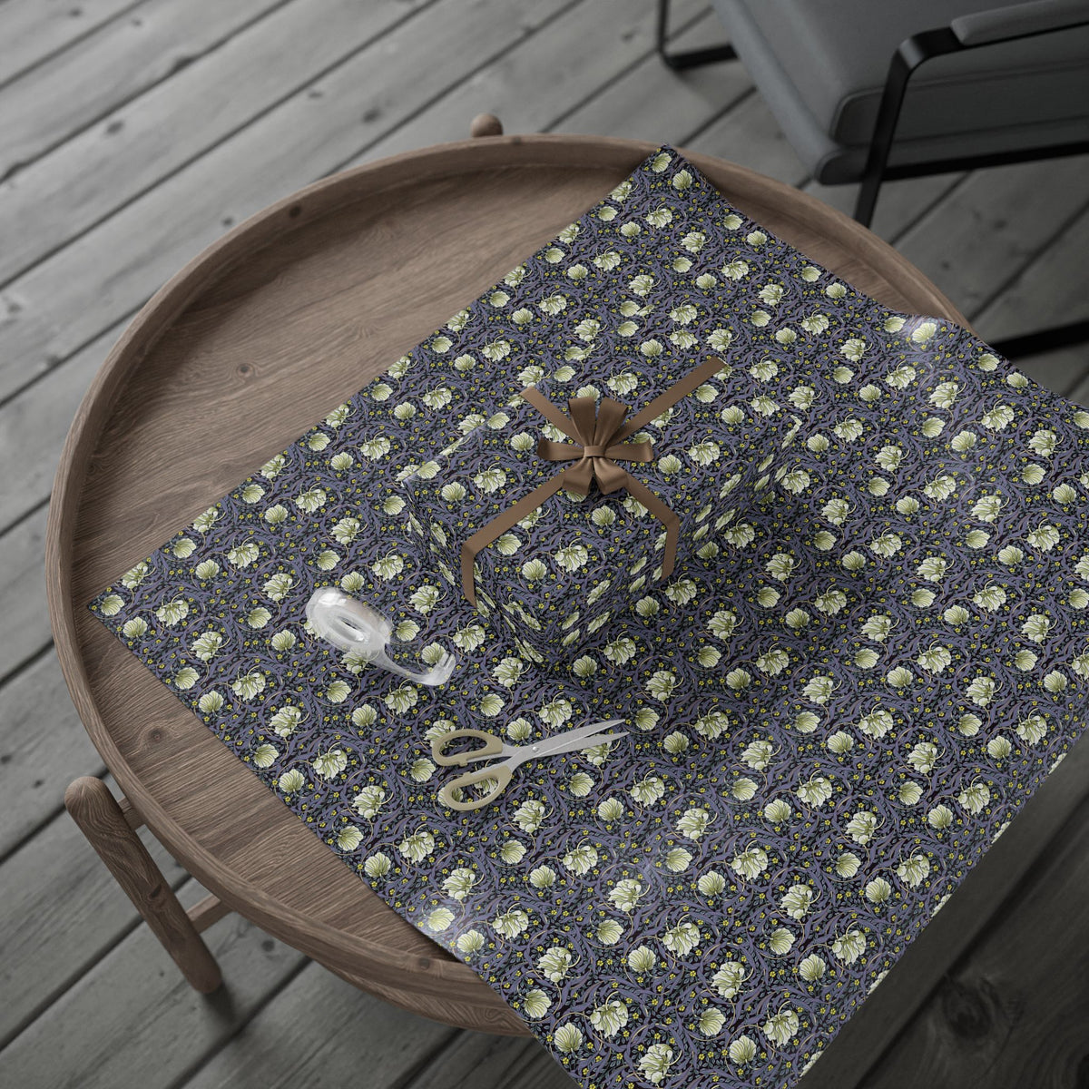 Gift box with floral pattern on a wooden tray