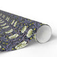 Roll of floral-patterned wrapping paper on a white background