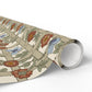 Roll of wrapping paper with floral and geometric design on a white background