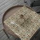 Decorative wrapping paper with floral pattern on a wooden tray