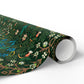 Roll of green floral-patterned paper on a white background