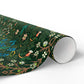 Roll of green floral and bird patterned paper on a white background