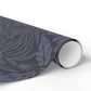 Roll of dark gray patterned vinyl wrap on a white background