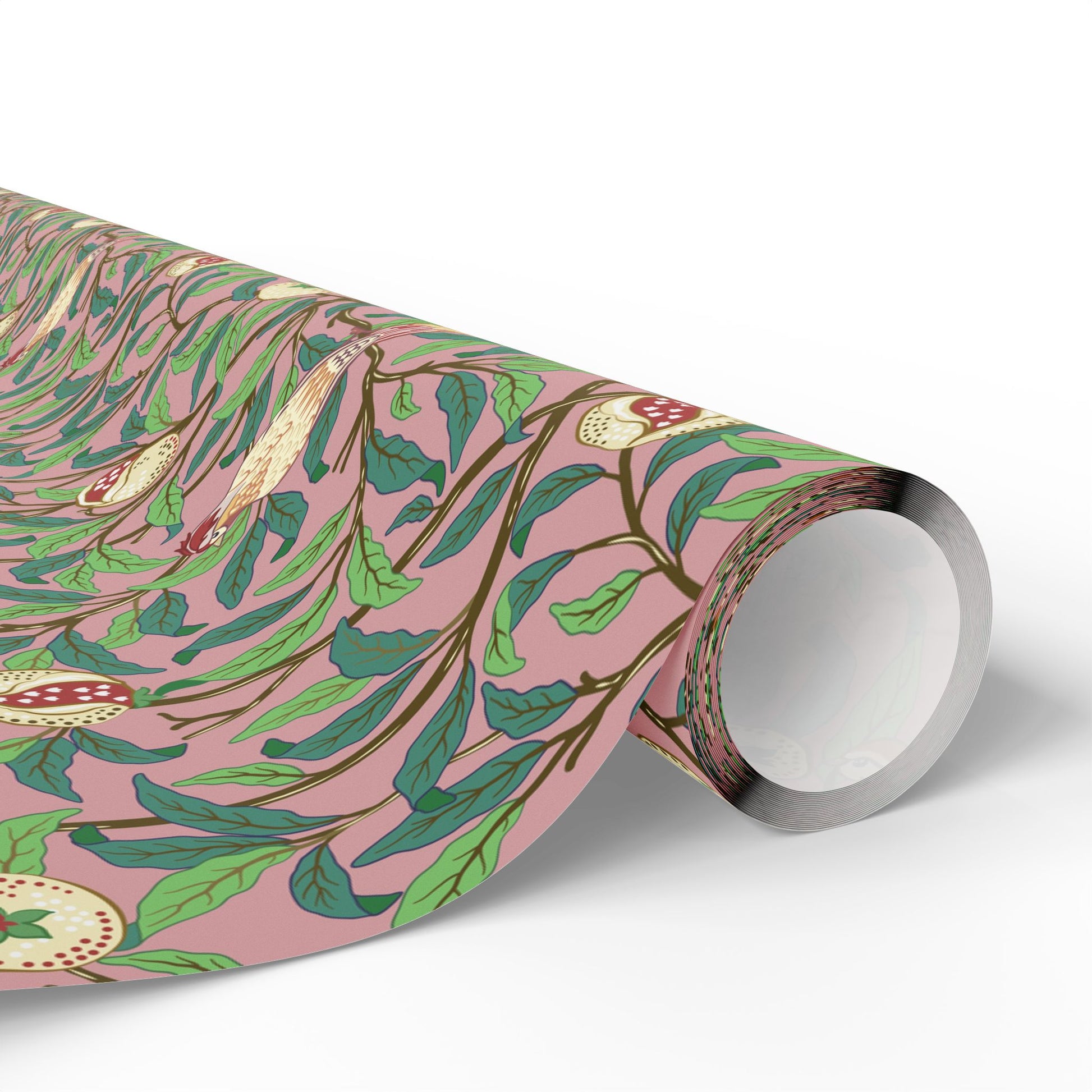 Roll of floral-patterned paper with green leaves and pink background on a white background
