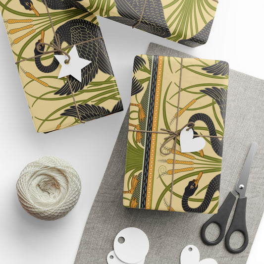 Gift-wrapped items with decorative patterns on a white surface with scissors and yarn.