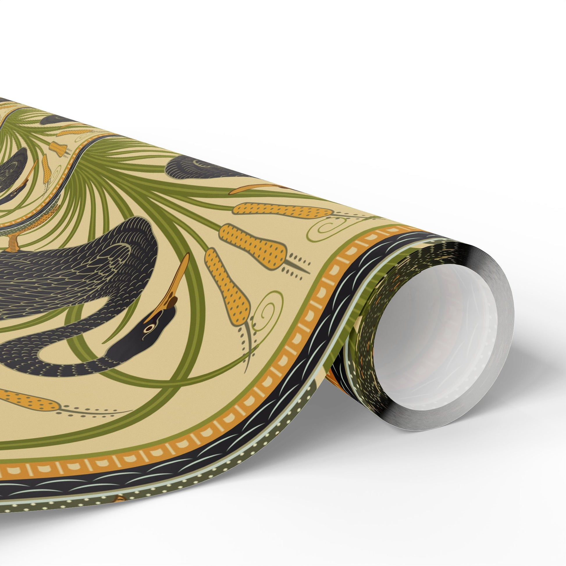 Roll of decorative tape with snake and plant design on a white background
