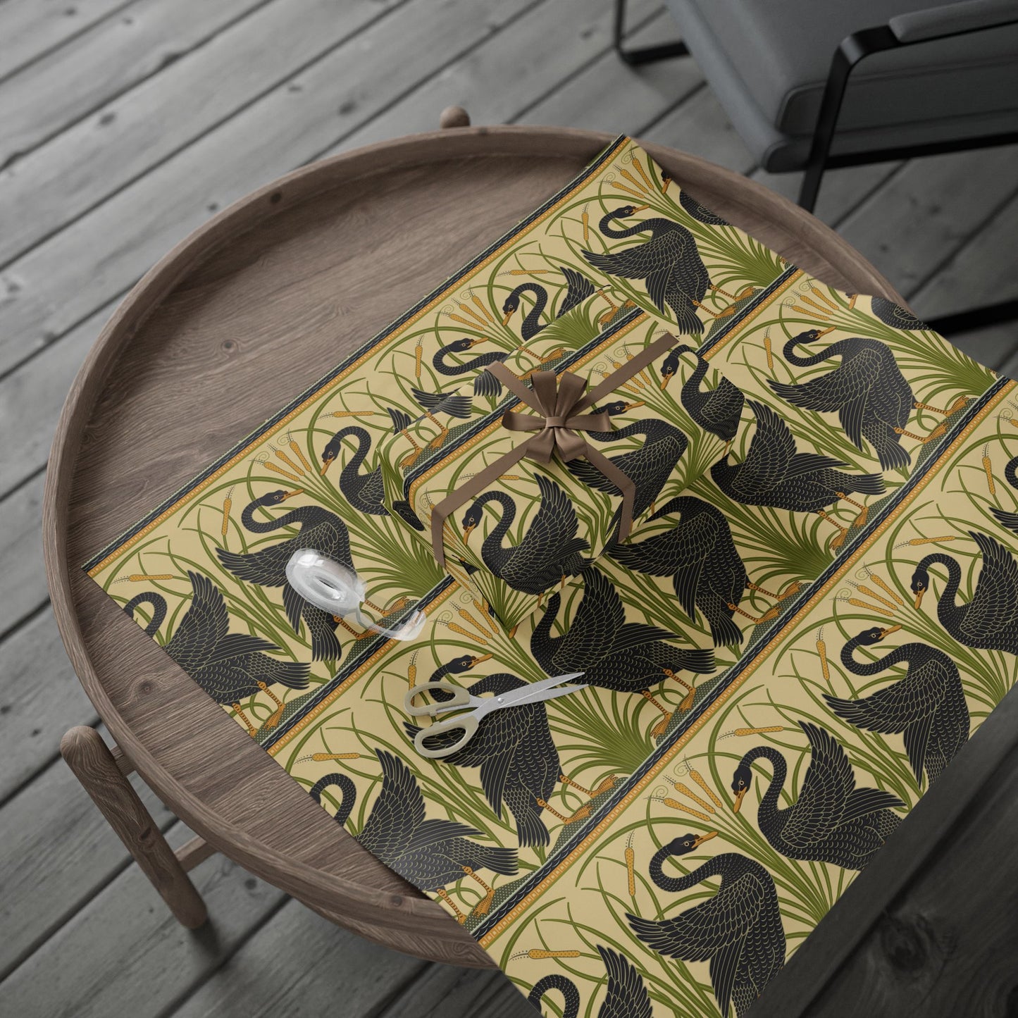 Decorative clock with swan design on a wooden tray