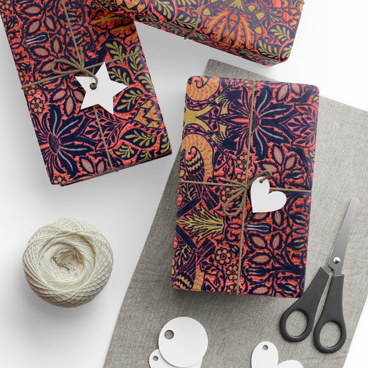 Decorative fabric with a floral William Morris & Co pattern, scissors, yarn, and tags on a white surface