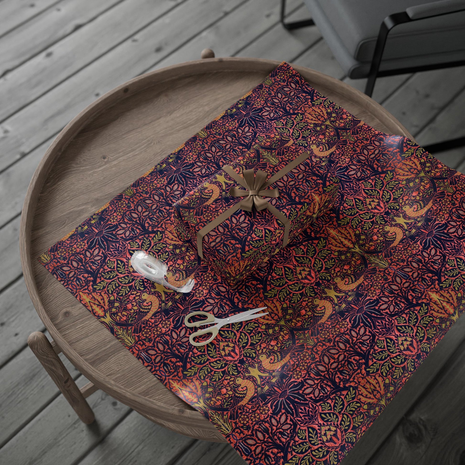 Patterned fabric with scissors on a wooden tray outdoors