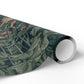 Roll of decorative paper with a leaf pattern on a white background