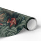 Roll of floral-patterned wallpaper on a white background