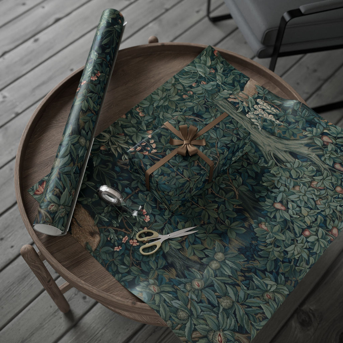 Wooden tray with floral-patterned fabric and tools on a wooden surface