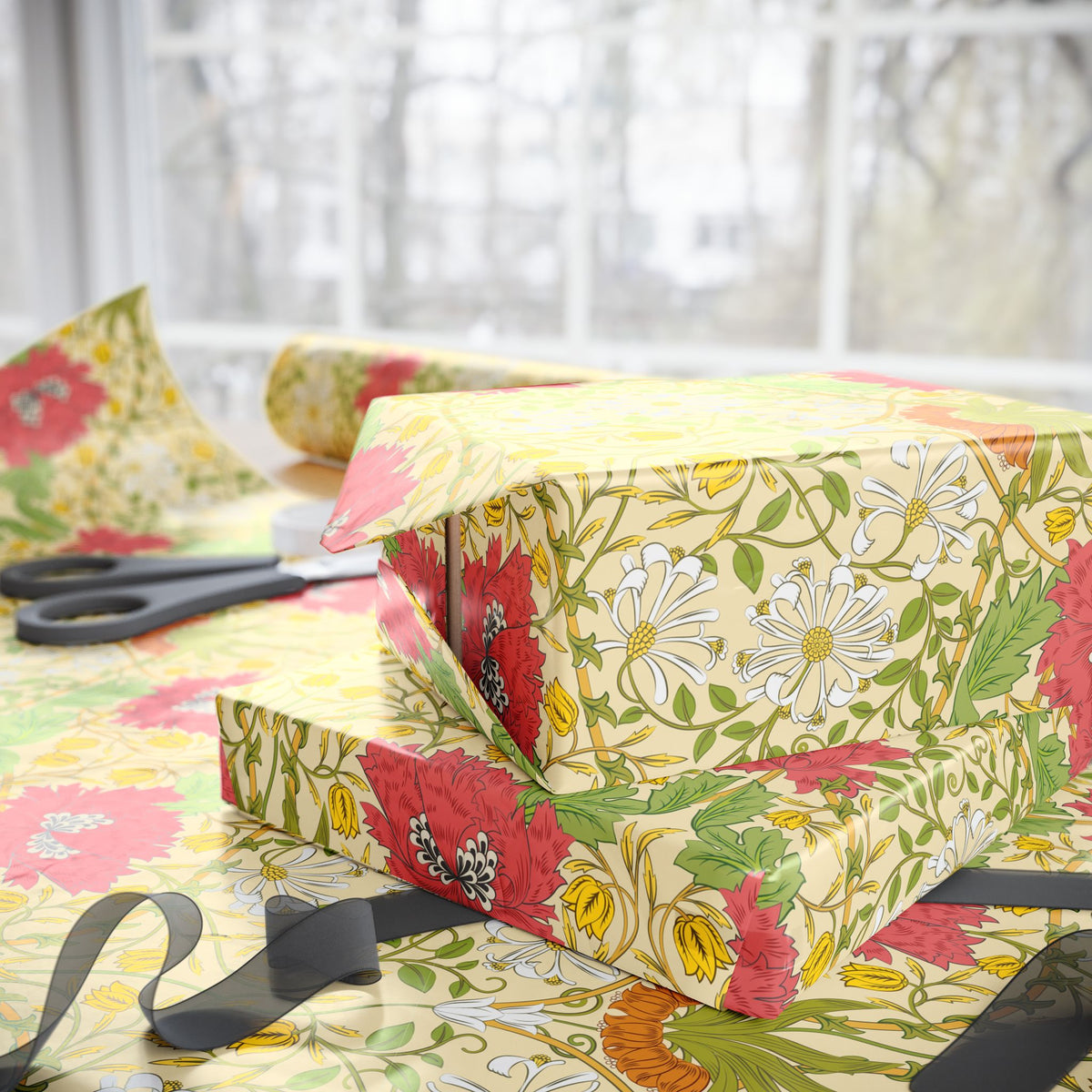 Floral-patterned fabric with scissors on a table