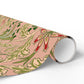 Roll of decorative paper with a floral pattern on a white background