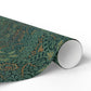 Roll of green patterned paper on a white background