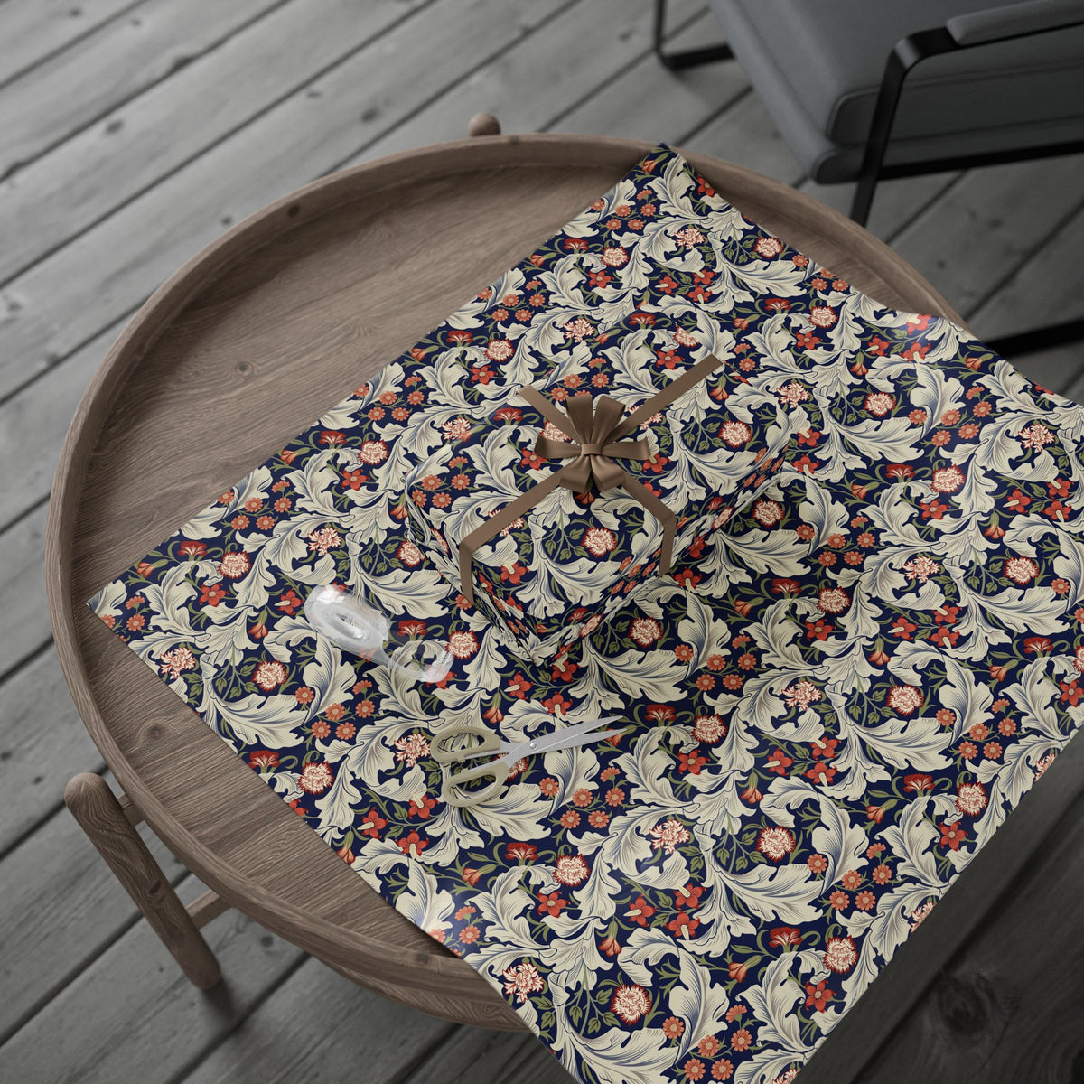 Floral-patterned wrapping paper on a wooden tray with a rustic background