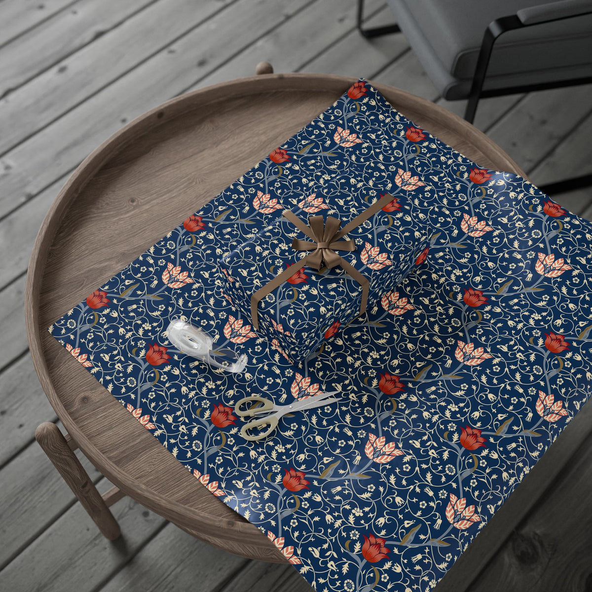 Decorative blue fabric with floral pattern on a wooden tray