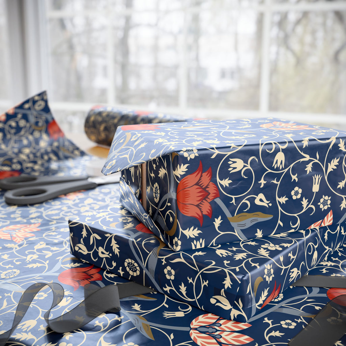 Stack of wrapped presents with floral pattern on a table