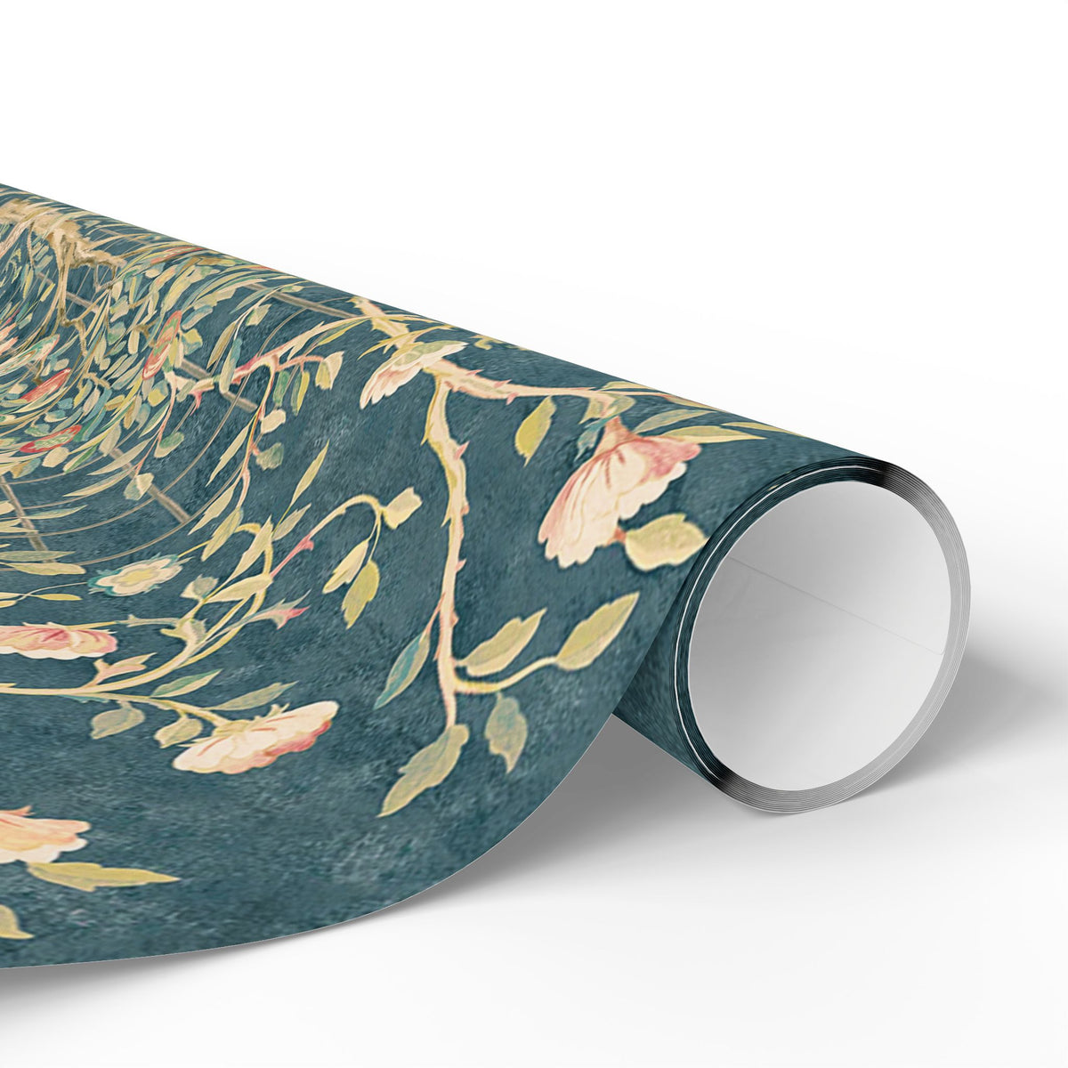 Roll of floral wrapping paper with a blue background on a white surface