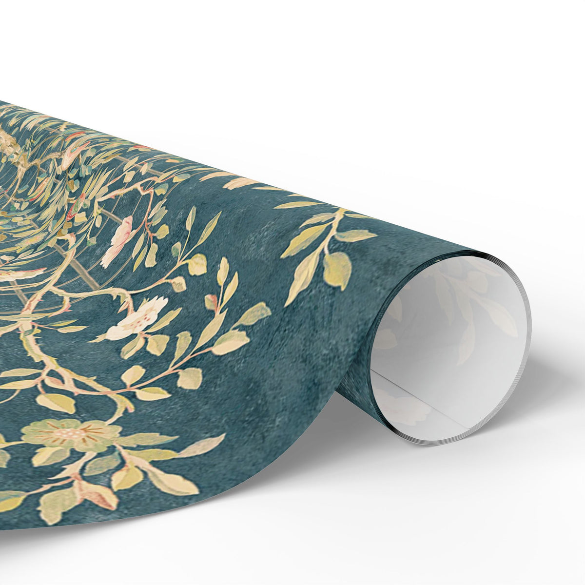 Roll of floral-patterned paper on a white background