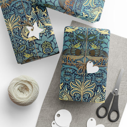 Patterned fabric with scissors and yarn on a white surface