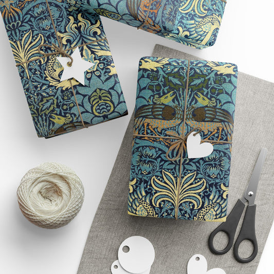 Patterned fabric with scissors and yarn on a white surface