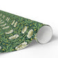 Roll of floral-patterned wrapping paper on a white background