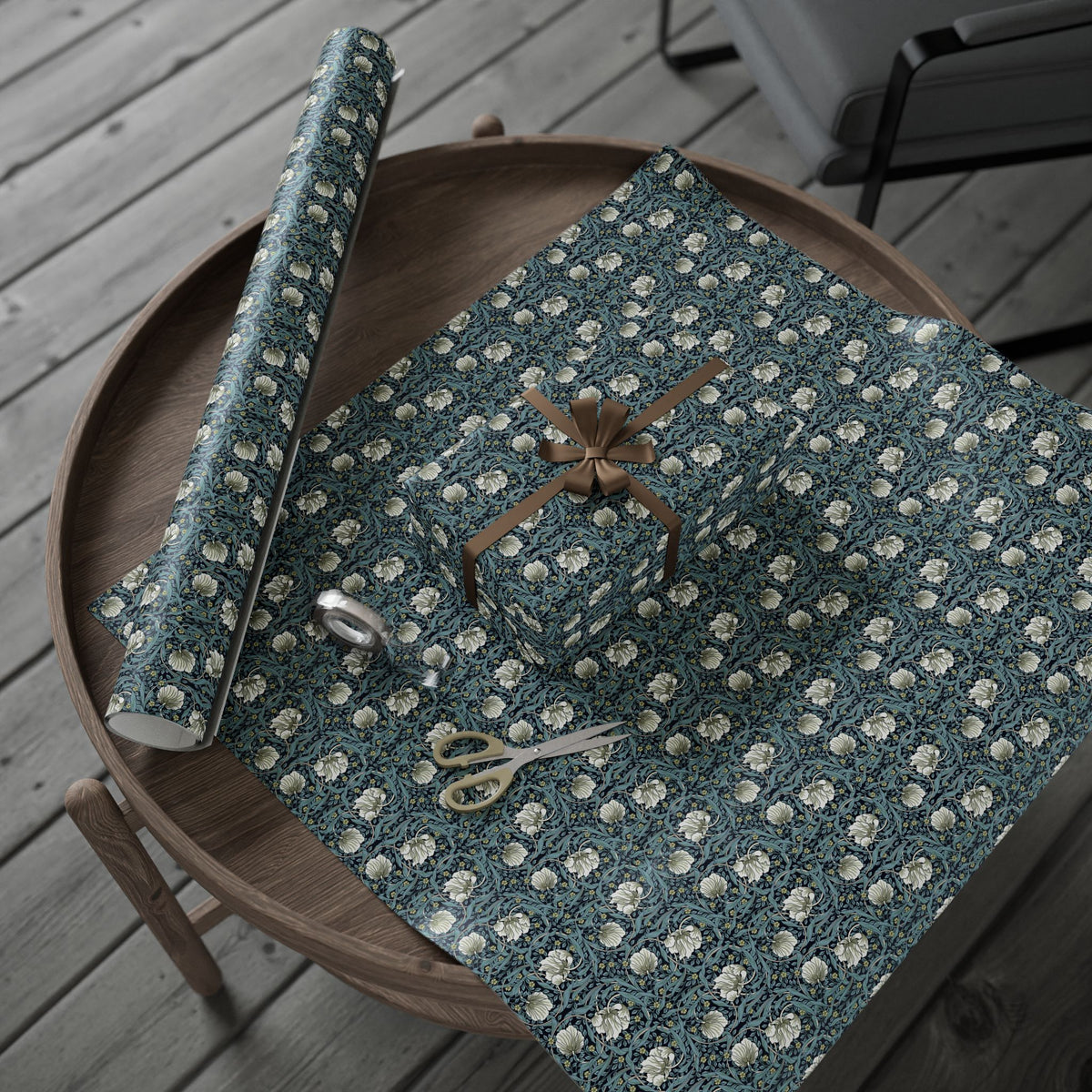 Decorative wrapping paper with floral pattern on a wooden surface
